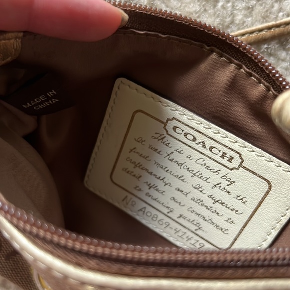 Coach wristlet with gold and flower accent - Picture 7 of 7